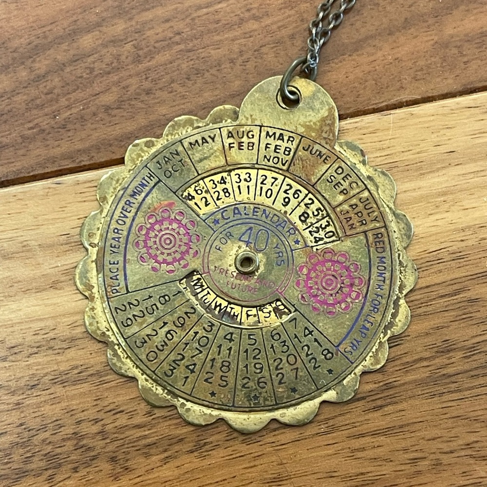 Vintage calendar necklace